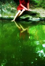 Figure Sitting on River Bank by Artist Richard Jenkins